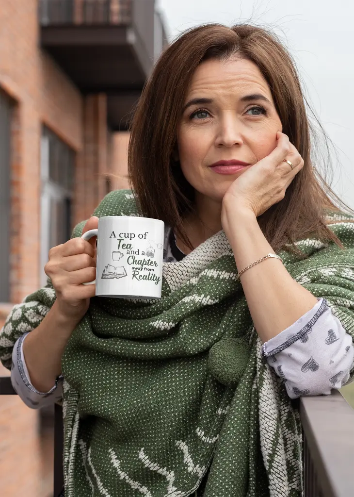 mockup-of-a-middle-aged-woman-holding-an-11-oz-coffee-mug-outside-31600.webp